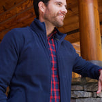 Man wearing Apex Full Zip over a woven shirt