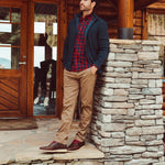 Man wearing Apex Full Zip over a woven shirt