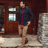 Man wearing Apex Full Zip over a woven shirt