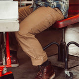 Man wearing Alpine Work Pant walking outdoor