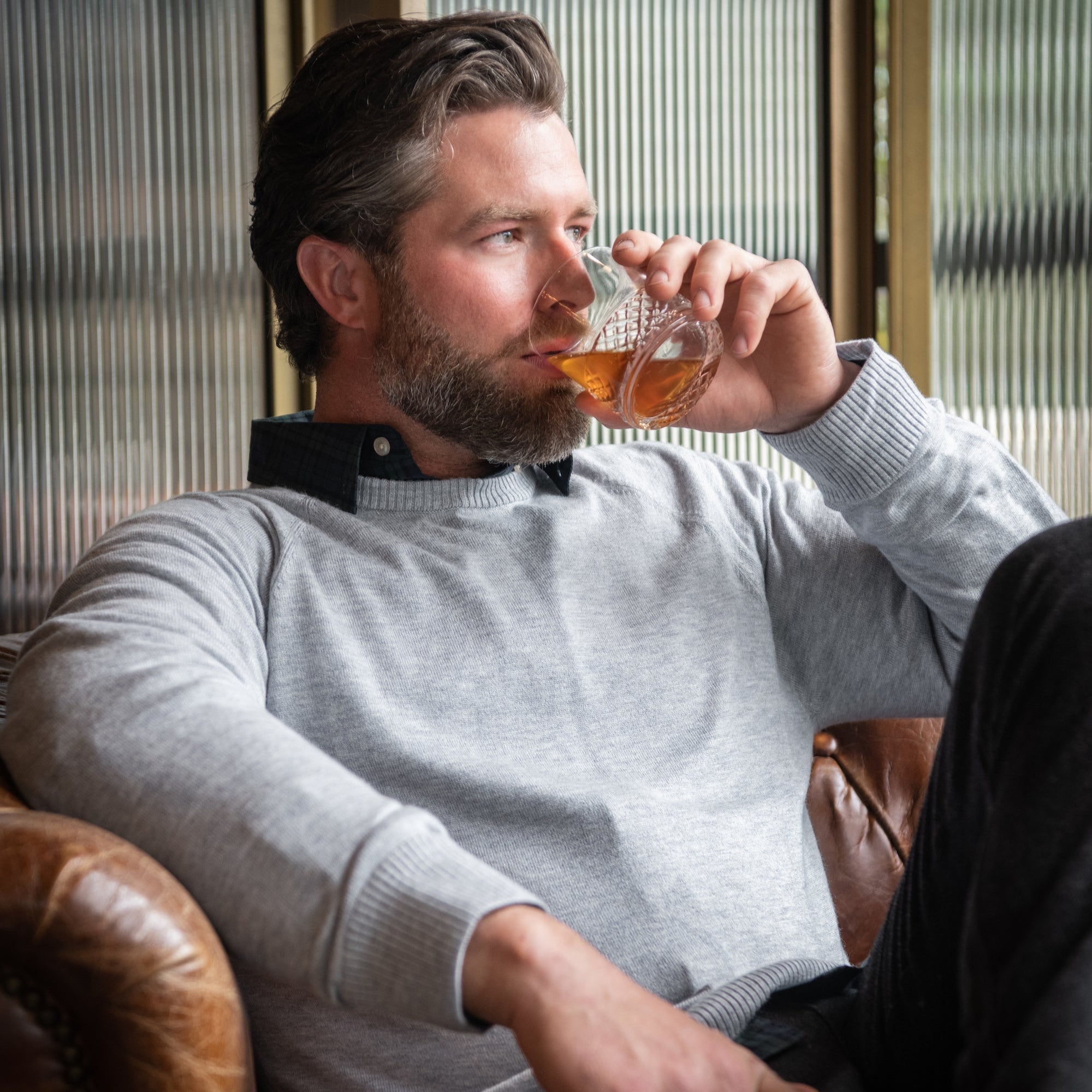 Man wearing Fletcher Sweater 