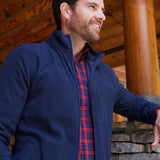Man wearing Apex Full Zip over a woven shirt