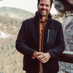 Man wearing Forge Jacket standing outside