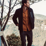 Man wearing Forge Jacket standing outside