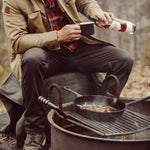 Man wearing Camber 201 Pant sitting outdoor