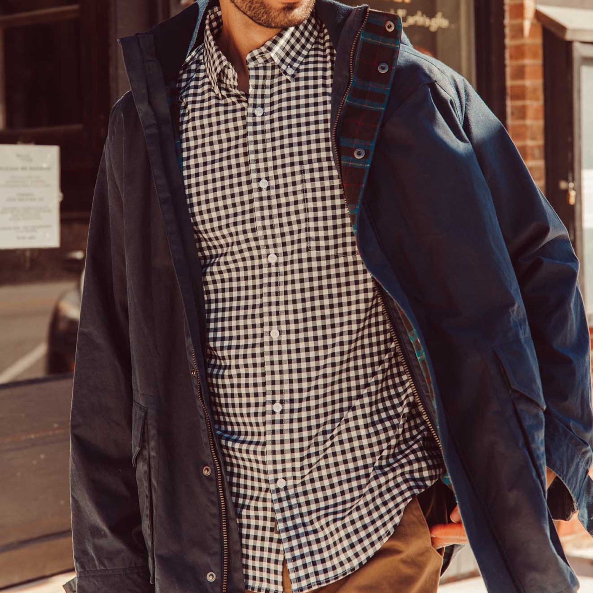 Man wearing Glacier Long Sleeve Shirt walking outside