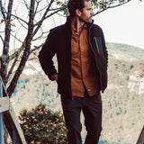 Man wearing Forge Jacket standing outside